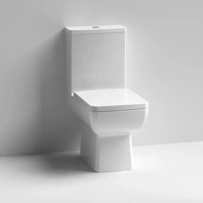 Mira Compact Close Coupled Toilet with Push Button Cistern & Seat - White