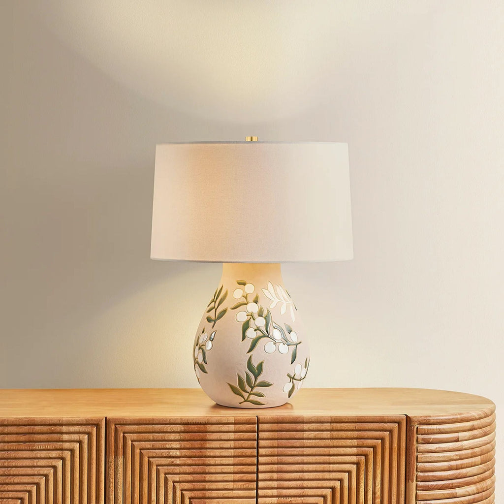 Mitzi Maeve 20.25 in. Table Lamp, Aged Brass with Ceramic Maybell Motif & White Linen Shade