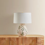Mitzi Maeve 20.25 in. Table Lamp, Aged Brass with Ceramic Maybell Motif & White Linen Shade