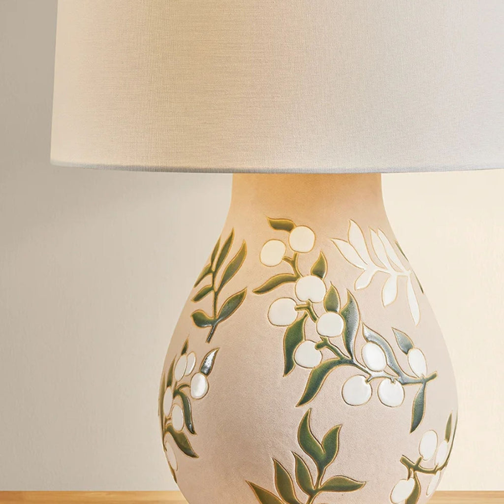 Mitzi Maeve 20.25 in. Table Lamp, Aged Brass with Ceramic Maybell Motif & White Linen Shade