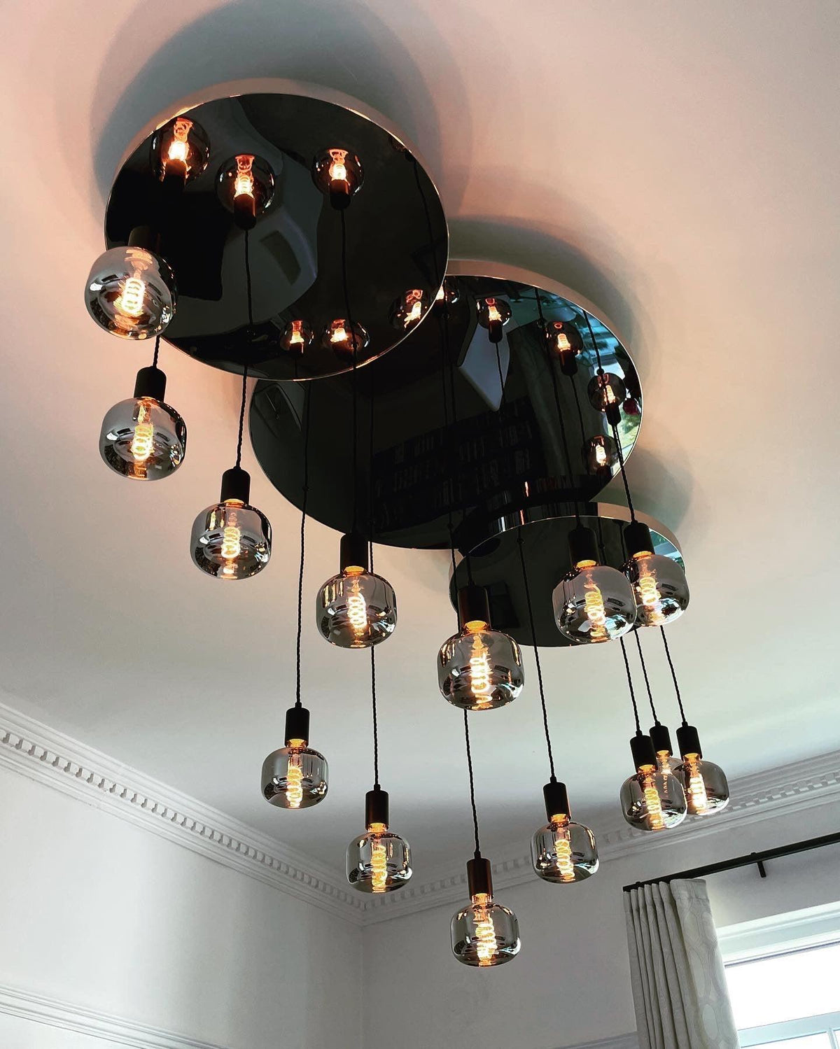 Modern Waves: Stainless Steel Mirrored Chandelier
